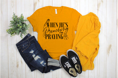 "He's Preaching, I'm Praying" Black Letter Tee